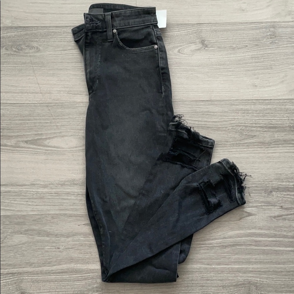 Joe’s ripped black jeans
